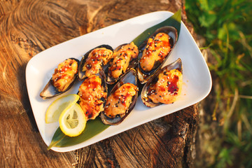 mussels baked with cheese on nature