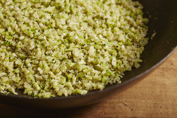 cooked, riced broccoli and cauliflower