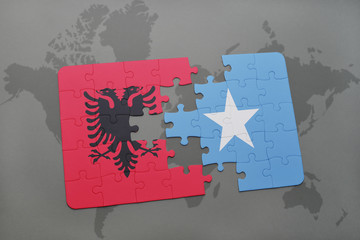 puzzle with the national flag of albania and somalia on a world map