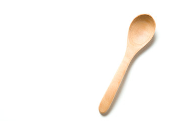 A wooden spoon isolated over white background