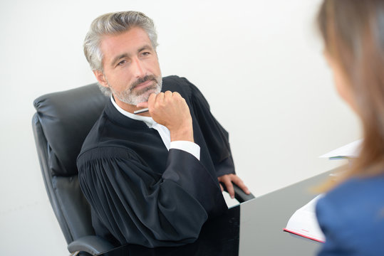 Legal worker listening to client