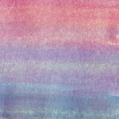 Abstract hand drawn watercolor background on textured paper in blue and purple shades