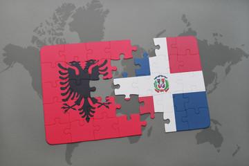 puzzle with the national flag of albania and dominican republic on a world map