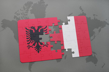 puzzle with the national flag of albania and peru on a world map
