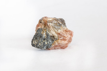 Piece of lead carbonate ore on white background