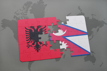 puzzle with the national flag of albania and nepal on a world map