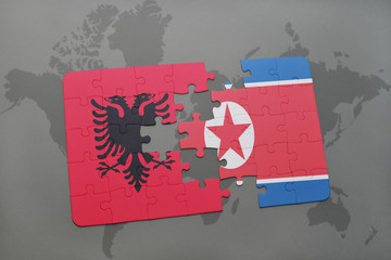 puzzle with the national flag of albania and north korea on a world map