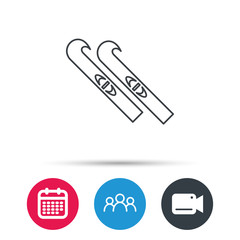 Skiing icon. Skis sign. Winter sport symbol. Group of people, video cam and calendar icons. Vector