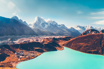 Himalayas. View from Gokyo Ri, 5360 meters up in the Himalaya Mountains of Nepal, snow covered high peaks and lake not far from Everest. Beautiful nature landscape. Travel background. - obrazy, fototapety, plakaty