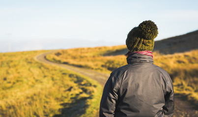 Female hiker in bobble hat