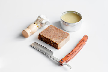 white desktop with tools for shaving beards