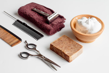 white desktop with tools for shaving beards