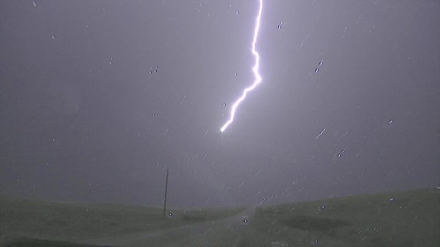 Slow Motion Upward Lightning Discharges from Tower