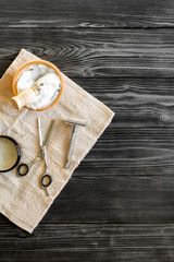 Tools for cutting beard barbershop top view on wooden background