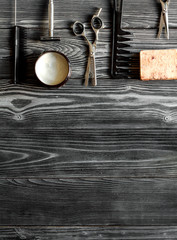 Tools for cutting beard barbershop top view on wooden background