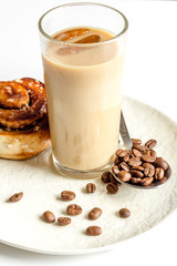 coffee with ice in glass on white background