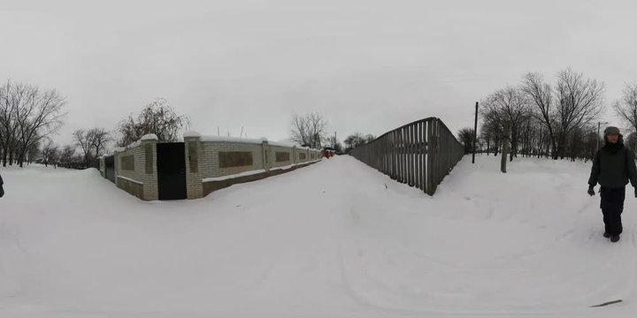 360Vr Video Man Between Fences of Houses Winter Snowy Cloudy Day Branch Trees Man is Walking at the Landscape Cityscape on Edge of Konotop Traveling