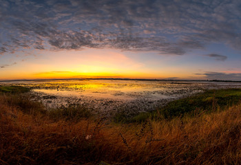 Landscape of sunrise over dam in Thailand