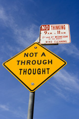 NOT A THROUGH THOUGHT warning sign against blue sky. Critical thinking concept.