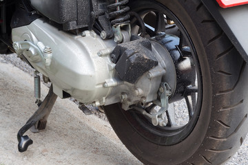 dirty mud on engine of scooter