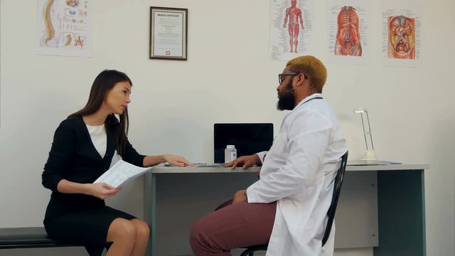 Unhappy female patient accusing doctor of medical malpractice
