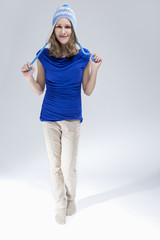 Full Length Portrait of Smiling Caucasian  Teenager With Teeth Brackets