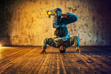 Young man break dancing