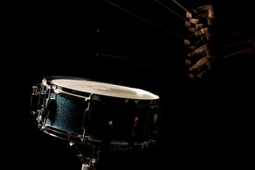 Fototapeta na wymiar The man is playing snare drum