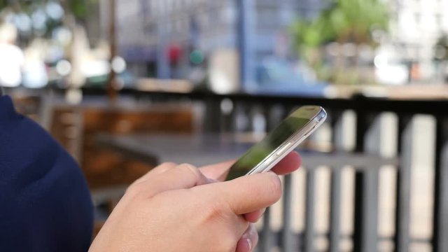 Video of woman using mobile phone in 4K. High quality video of woman using mobile phone in 4K