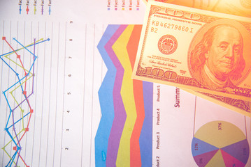 Business concept with money and documents graph, report finance.