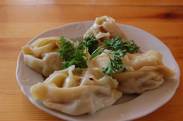 meat manti with a parsley