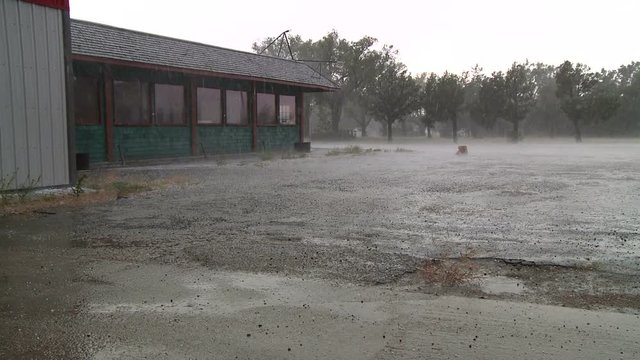 Rain and Wind Pelt Empty Parking Lot