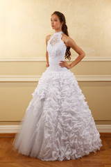 Fototapeta premium Classical young gorgeous bride with long brown hair. Studio shoot