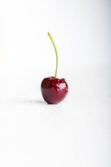 Wet fresh juicy single cherry