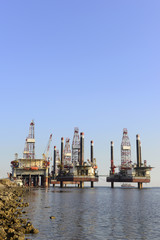 Fototapeta na wymiar Oil drilling platform in the sea