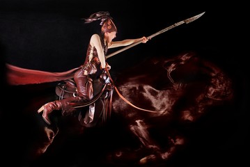 Girl in national clothes of the nomads in the saddle - obrazy, fototapety, plakaty