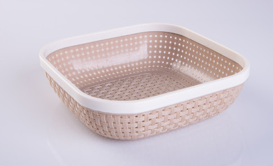 basket or empty plastic basket on a background.