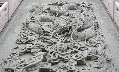 Bangkok, Thailand - January 15, 2017: Traditional chinese dragon stone carved on displayed in chinese temple in bangkok, Thailand