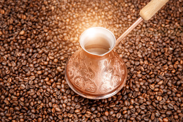 Coffee pot is shiny on the coffee beans.