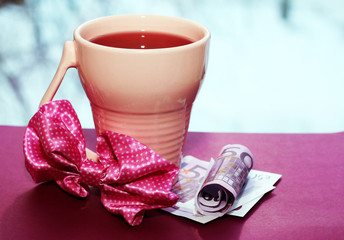 Pink cup and money, romantic  beautiful morning