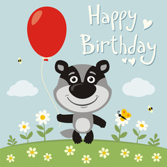 Obraz premium Happy birthday! Funny badger with red balloon on flower meadow. Birthday card with badger in cartoon style.