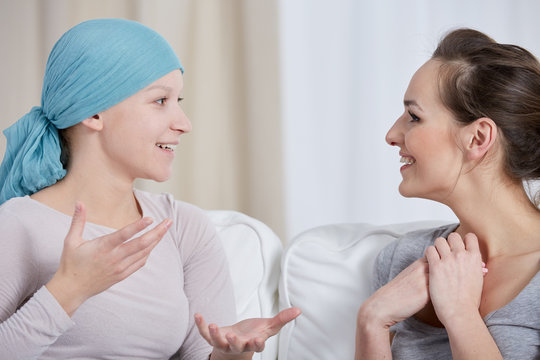 Young cancer woman with friend
