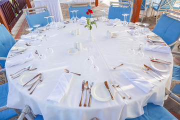 a round table in the restaurant, served for 12 persons, view fro