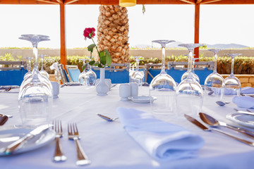 a round table in the restaurant, served for 12 persons