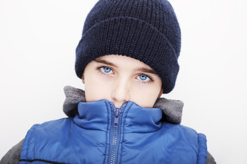 Portrait of a handsome boy in winter clothes