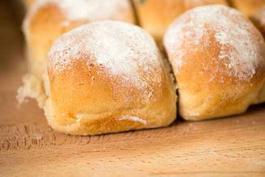 Bread Buns on Wooden Surface