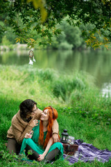 Young couple resting at the nature outdoors