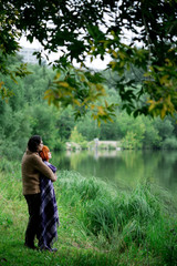 Romantic loving couple resting at the nature