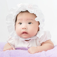 Portrait of adorable baby girl with hat