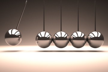 Metal spheres bouncing in line